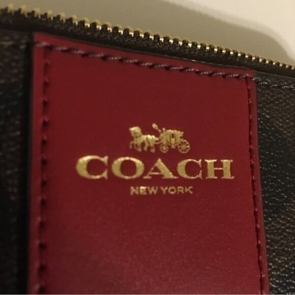 Coach signature coated canvas wristlet
